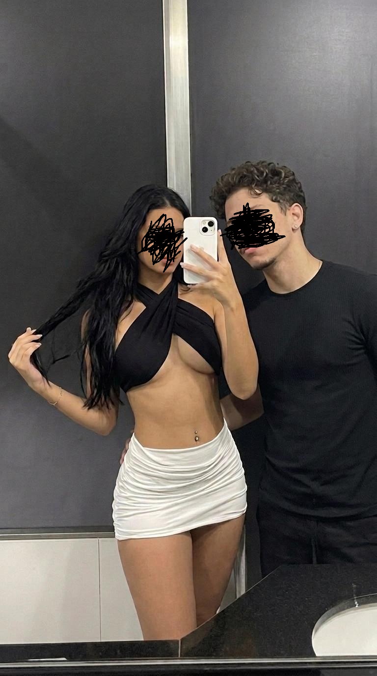Mirror photo of us, with our faces covered