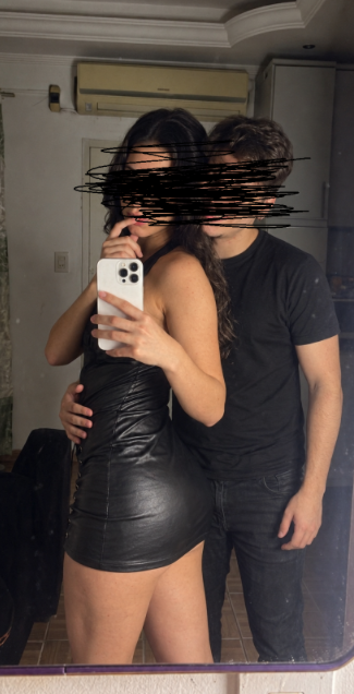 Photo of us together, with our faces covered